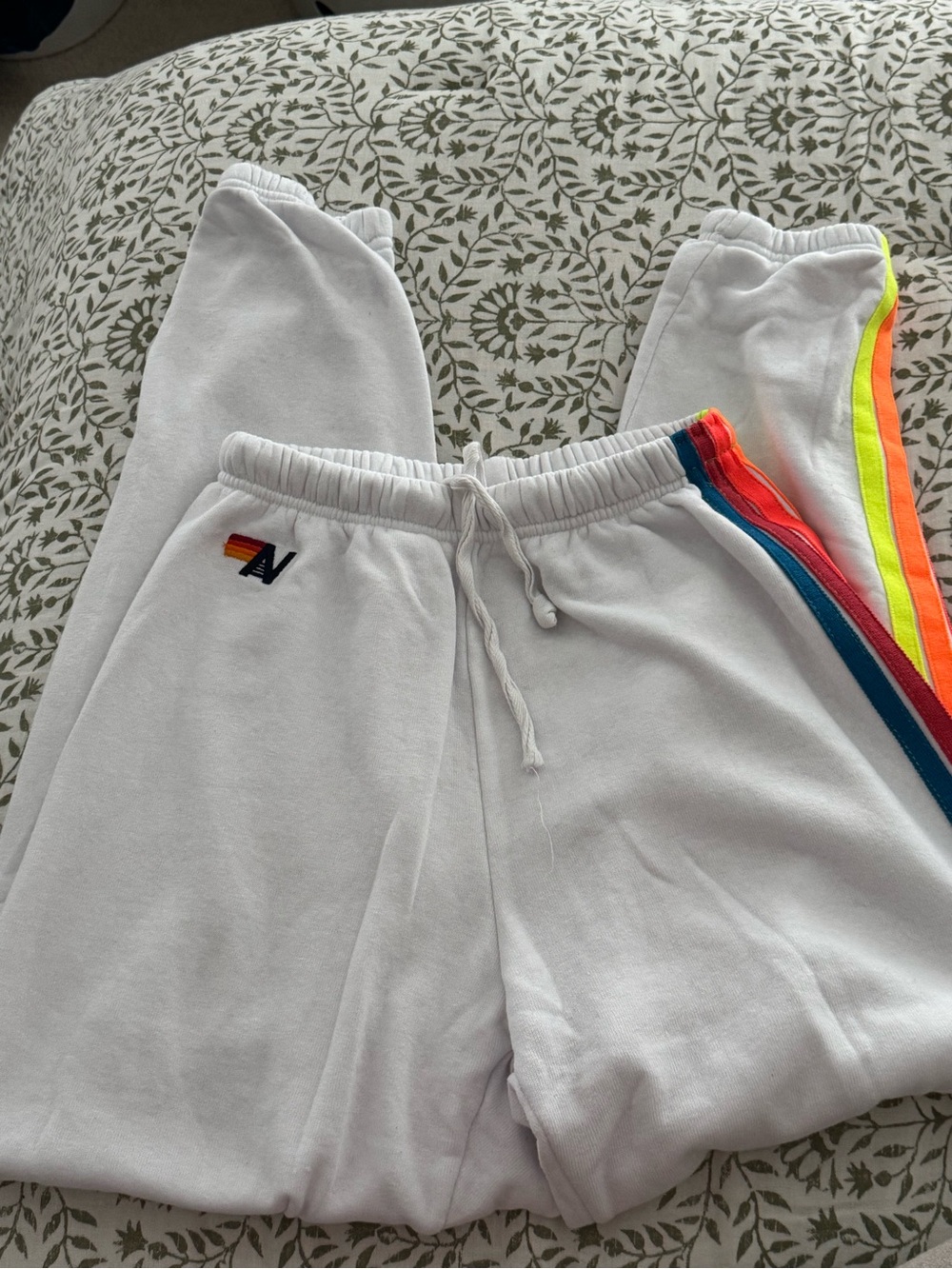 White Women’s Sweatpants with Rainbow Side Stripes